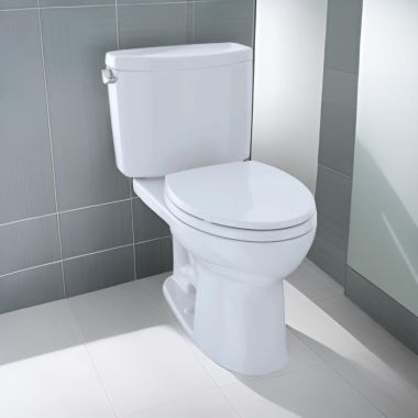 Click here to see Toto CST454CEFG#01 TOTO Drake II Two-Piece Close Coupled Toilet, Elongated, Less Seat, Universal Height, 1.28 GPF, Cotton White - CST454CEFG#01