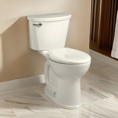 Click here to see American Standard 215FA.104.222 American Standard Cadet PRO Two-Piece Compact Toilet, Less Seat, Elongated, Right Height, 1.28 GPF, Linen - 215FA.104.222