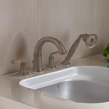 Click here to see American Standard 7420.901.224 American Standard Portsmouth Deck Mounted Roman Tub Faucet with Personal Handshower, Two Metal Lever Handles, ADA, Oil Rubbed Bronze, Brass - 7420.901.224