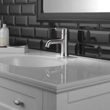 Click here to see Delta 559LF-SSMPU Delta Trinsic Tube Spout Stainless Lavatory Faucet with Escutcheon, Metal Pop-Up, 1.2 GPM, Single-Handle, Lever Handle - 559LF-SSMPU