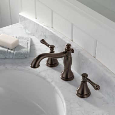 Click here to see Delta 3597LF-RBMPU Delta Cassidy Hook Spout Venetian Bronze Lavatory Faucet for 6