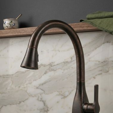 Click here to see DELTA FAUCETS COMPANY RP81910RB Delta RP81910RB Kitchen Spout Assembly with Magnet, Venetian Bronze