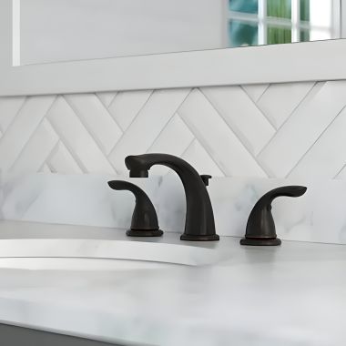 Click here to see Pfister LG149-610Y Pfister Pfirst Series Widespread Bathroom Faucet with Pop-Up Drain, Two-Handle, 1.2 GPM, Lever Handle, Pforever Seal, Tuscan Bronze - LG149-610Y