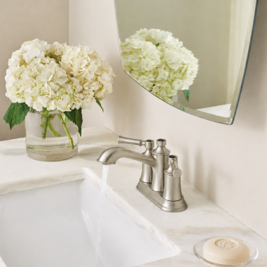 Click here to see  6802BN Moen Dartmoor Two-Handle Centerset Bathroom Faucet with Metal Pop-Up Drain, 1.2 GPM, Brushed Nickel - 6802BN