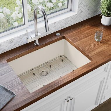 Click here to see Elkay ELXRU13322PA0 Elkay Quartz Luxe Parchment 33in x 18-7/16in x 9-7/16in Single Bowl Undermount Sink with Rear Center Drain - ELXRU13322PA0