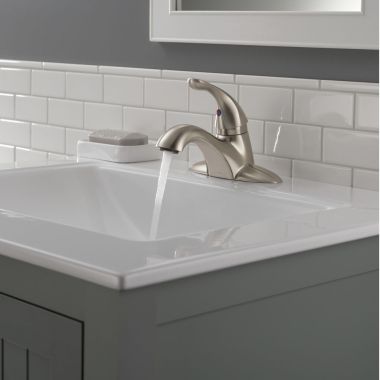 Click here to see Delta 520-SSMPU-DST Delta Classic Low-Arc Stainless Lavatory Faucet for 4