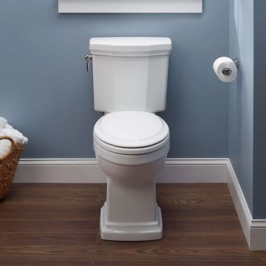 Click here to see Toto CST404CEFG#01 TOTO Promenade II Two-Piece Toilet, 1.28 GPF,  Universal Height, Cotton White - CST404CEFG#01
