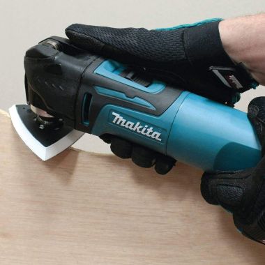 Click here to see Makita TM3010CX1 Makita Oscillating Multi-Tool Kit with Variable Speed, 3 Amp Motor with 6,000 - 20,000 OPM - TM3010CX1