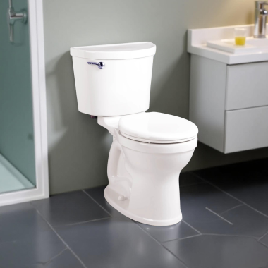Click here to see American Standard 211BA.004.020 American Standard Champion PRO Round Two-Piece Toilet with Left Hand Trip Lever, 1.6 GPF, White - 211BA.004.020