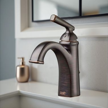 Click here to see American Standard 7018.101.278 American Standard Edgemere Single-Hole Bathroom Faucet, Metal Lever Handle, WaterSense, ADA, 1.2 GPM, Legacy Bronze - 7018.101.278