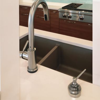 Click here to see Delta RP1001SS Delta 13oz Contemporary Soap and Lotion Dispenser, Round, Stainless - RP1001SS