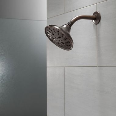 Click here to see Delta 52669-RB Delta H2Okinetic 5-Setting Traditional Raincan Shower Head, 1.75 GPM, Venetian Bronze - 52669-RB