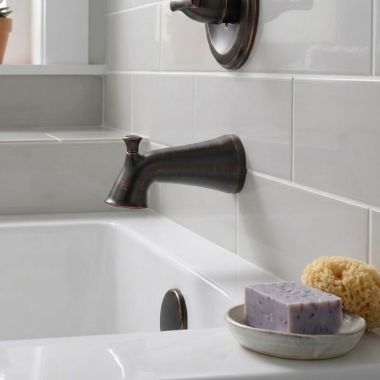 Click here to see Delta RP51303RB Delta Esato Pull-Up Diverter Tub Spout, Wall-Mount Single-Hole Installation, Venetian Bronze - RP51303RB