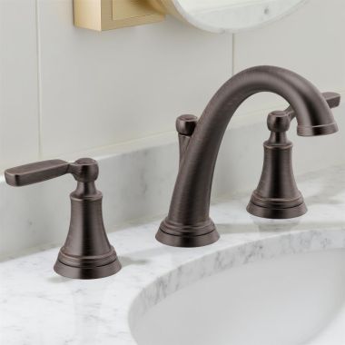Click here to see Delta 3532LF-RBMPU Delta Woodhurst Widespread Two-Handle Lavatory Faucet with Metal Pop-Up Drain, 1.2 GPM, Lever Handles, Venetian Bronze - 3532LF-RBMPU