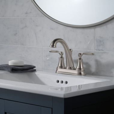 Click here to see Delta 2532LF-SSTP Delta Woodhurst Two-Handle Centerset Bathroom Faucet, Tract-Pack, 1.2 GPM, Stainless - 2532LF-SSTP