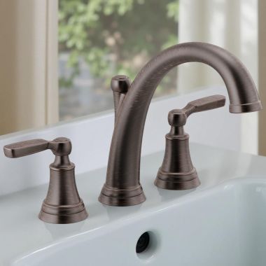 Click here to see Delta T2732-RB Delta Woodhurst Two-Handle Roman Tub Faucet Trim Only, Lever Handles, ADA-Compliant, Less Valve, Venetian Bronze - T2732-RB