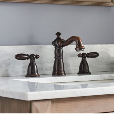 Click here to see Delta 35955-RB-DST Delta Victorian Hook Spout Venetian Bronze Lavatory Faucet for 4