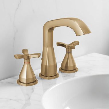 Click here to see Delta 357766-CZMPU-DST Delta Stryke Widespread Bathroom Faucet With Metal Pop-Up, Helo Spoke Handles, DIAMOND Seal, ADA, 1.2 GPM, Champagne Bronze - 357766-CZMPU-DST