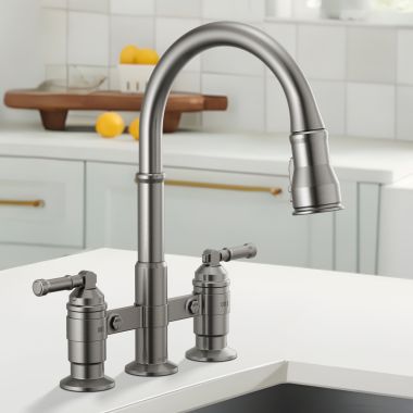 Click here to see Delta 2390L-KS-DST Delta Broderick Two Handle Pull Down Bridge Kitchen Faucet, DIAMOND Seal, ShieldSpray, MagnaTite, ADA, 1.8 GPM, Black Stainless - 2390L-KS-DST