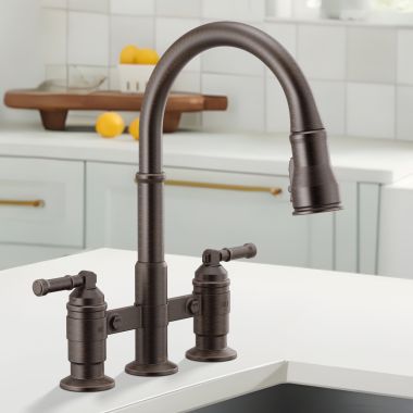 Click here to see Delta 2390L-RB-DST Delta Broderick Two Handle Pull Down Bridge Kitchen Faucet, DIAMOND Seal, ShieldSpray, MagnaTite, ADA, 1.8 GPM, Venetian Bronze - 2390L-RB-DST