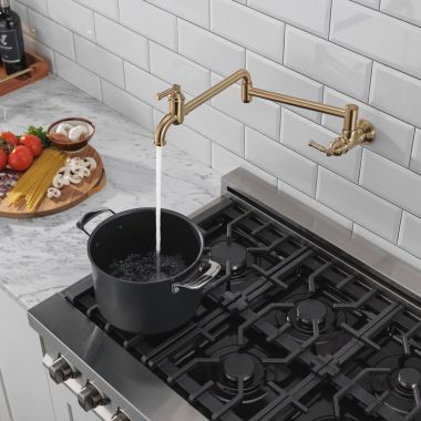 Click here to see Delta 1190LFL-CZ Delta Broderick Wall-Mount Pot Filler Faucet, Champagne Bronze - 1190LFL-CZ