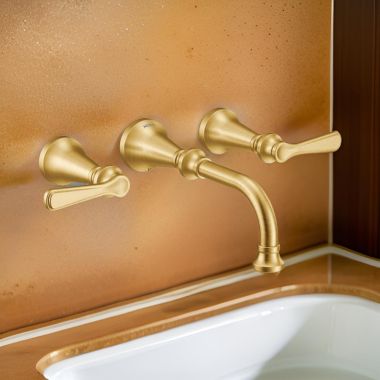 Click here to see Moen TS44104BG Moen Colinet Two-Handle Wall-Mount Bathroom Faucet, 1.2 GPM, Lever Handles, WaterSense, Brushed Gold - TS44104BG