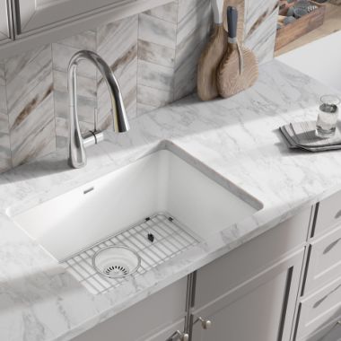 Click here to see Elkay ELGU2522WH0C Elkay Quartz Classic White 25in x 18in Undermount Single Bowl Kitchen Sink Kit with Rear Center Drain, Bottom Grid, Strainer, and Cleaning Kit - ELGU2522WH0C