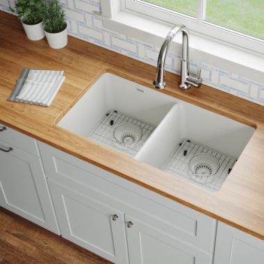 Click here to see Elkay ELGU3322WH0FC Elkay Quartz Classic White Equal Double-Bowl Undermount Sink Kit with Faucet, 33
