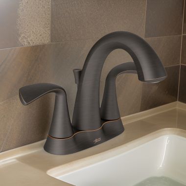 Click here to see American Standard 7186201.278 American Standard Fluent Two Lever Handle Centerset Legacy Bronze Bathroom Faucet with Metal Speed Connect Pop-Up Drain, 1.2 GPM, Lead-Free - 7186.201.278