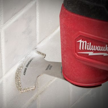 Click here to see Milwaukee 49-25-2271 Milwaukee 1-Pack OPEN-LOK Diamond Grit Grout Removal Blade for Oscillating Multi-Tools - 49-25-2271 