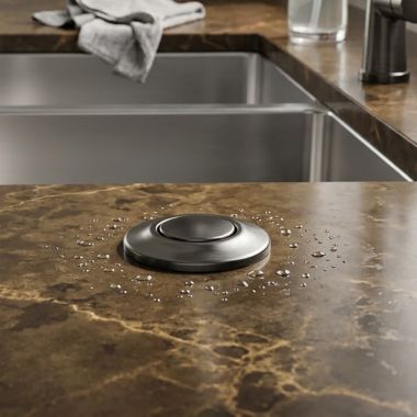 Click here to see  72050-KS Delta Air Switch w/ Dual Outlet, Black Stainless - 72050-KS