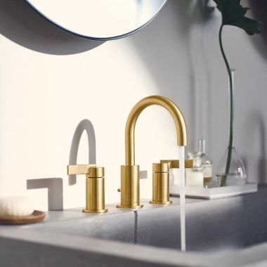 Click here to see Moen T6222BG Moen Cia Two-Handle Brushed Gold Widespread Lavatory Faucet Trim with Metal Pop-Up, M-PACT, Duralock, 1.2 GPM, ADA Lever Handles, Three-Hole - T6222BG