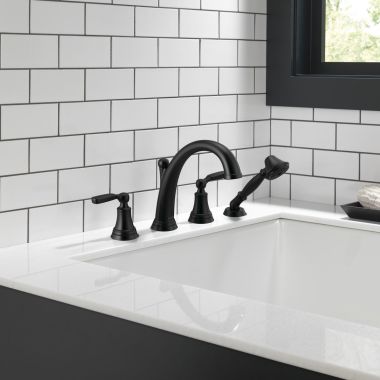 Click here to see Delta T4732-BL Delta Woodhurst Two-Handle Roman Tub Faucet Trim w/ 1.75 GPM Single-Setting Hand Shower, Lever Handles, Matte Black - T4732-BL