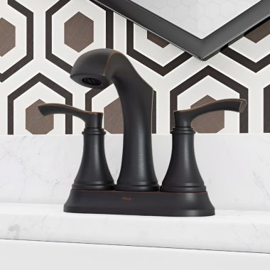 Click here to see Pfister LG48-WD0Y PFISTER LG48-WD0Y WOODBURY TWO HANDLE LAV FAUCET TUSCAN BRONZE