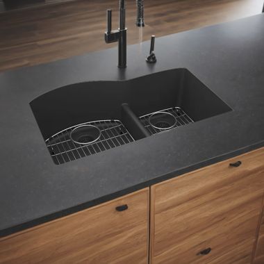 Click here to see Elkay ELGHU3322RMB0C Elkay Quartz Classic Matte Black 33in x 22in x10in Undermount with Rear Center Drain, Double Bowl Aqua Divide Sink with Bottom Grids, Drains, and Cleaning Kit - ELGHU3322RMB0C