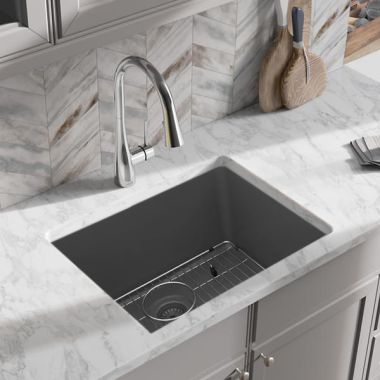 Click here to see Elkay ELGU2522GT0C Elkay Quartz Classic Graphite 25in x 18in Undermount Single Bowl Kitchen Sink Kit with Rear Center Drain, Bottom Grid, Strainer, and Cleaning Kit - ELGU2522GT0C