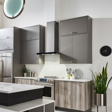 Click here to see Broan BWT1304SSB Broan-NuTone 30-Inch Convertible Wall-Mount T-Style Chimney Range Hood, 450 CFM, Stainless Steel With Black Glass - BWT1304SSB