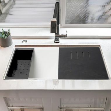 Click here to see Alfi AB3418DBUM-W ALFI White Granite Composite Workstation, 33in Undermount With Step Offset Drain, Rim Double Bowl Sink With Cutting Board, Colander, and Sink Grid - AB3418DBUM-W