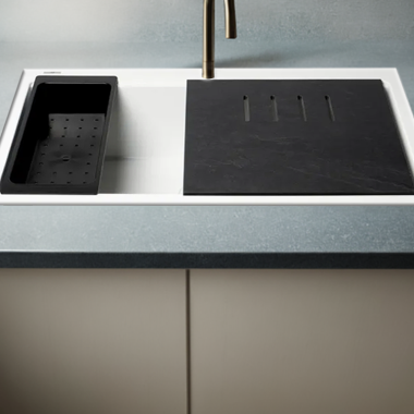 Click here to see Alfi AB3418SBDI-W ALFI White Granite Composite Workstation, 33in Drop In With Center Drain, Step Rim Single Bowl Drop In Sink With Cutting Board, Colander, and Roll Mat - AB3418SBDI-W