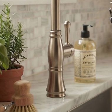 Click here to see Delta RP92377CZPR Delta Handle, Set Screw, and Button for Cassidy 9197-DST Kitchen and 9997-DST Bar/Prep Faucets, Lumicoat Champagne Bronze - RP92377CZPR