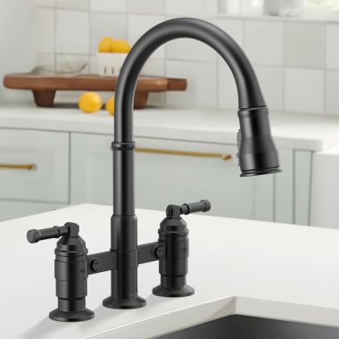 Click here to see Delta 2390L-BL-DST Delta Broderick Two Handle Pull Down Bridge Kitchen Faucet, Diamond Seal, ShieldSpray, MagnaTite, ADA, 1.8 GPM, Matte Black - 2390L-BL-DST
