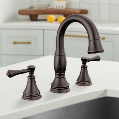 Click here to see Delta 3597-RBPD-DST Delta Cassidy Two Handle Pull Down Widespread Bathroom Faucet, DIAMOND Seal, ADA, 1.2 GPM, Venetian Bronze - 3597-RBPD-DST
