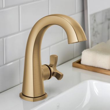 Click here to see Delta 5776-CZ-PR-MPU-DST Delta Stryke Single Handle Deck Mounted Bathroom Faucet With Drain, Helo Spoke, 1.2 GPM, Lumicoat Champagne Bronze - 5776-CZ-PR-MPU-DST
