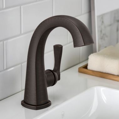 Click here to see Delta 577-RBMPU-DST Delta Stryke Single Handle Deck Mounted Bathroom Faucet With Drain, Lever, 1.2 GPM, Venetian Bronze - 577-RBMPU-DST