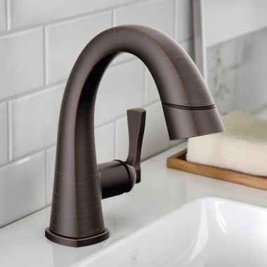 Click here to see Delta 577-RBPD-DST Delta Stryke Pull-Down Bathroom Faucet, Single Handle, DIAMOND Seal, MagnaTite, ADA, 1.2 GPM, Venetian Bronze - 577-RBPD-DST