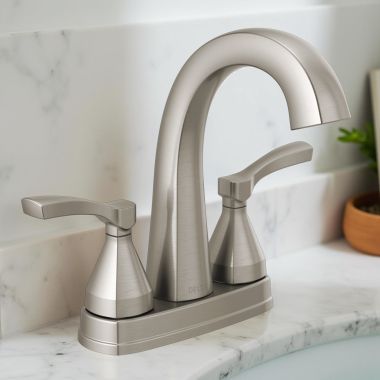 Click here to see Delta 25775-SS-PR-MPU-DST Delta Stryke High-Arc Centerset Lavatory Faucet With Metal Pop-Up, Two-Handle, DIAMOND Seal, Lever Handles, 1.2 GPM, Lumicoat Stainless - 25775-SS-PR-MPU-DST