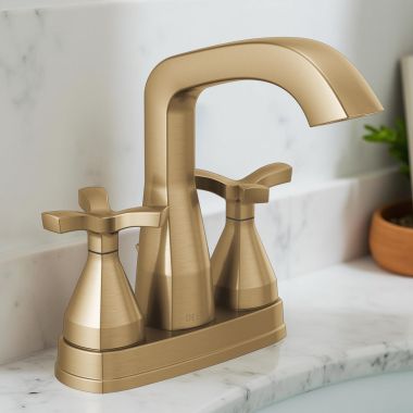 Click here to see Delta 257766-CZ-PR-MPU-DST Delta Stryke Centerset Faucet With Metal Pop-Up, DIAMOND Seal, Helo Spoke Handles, 1.2 GPM, Lumicoat Champagne Bronze - 257766-CZ-PR-MPU-DST