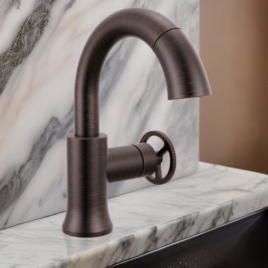 Click here to see Delta 558HAR-RBPD-DST Delta Trinsic Pull-Down Bathroom Faucet, Wheel Handle, High Arc Spout, DIAMOND Seal, MagnaTite Docking, 1.2 GPM, Venetian Bronze - 558HAR-RBPD-DST