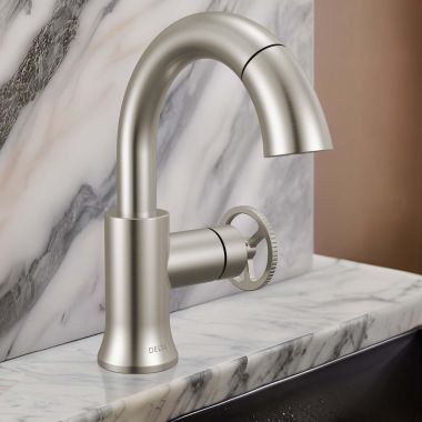 Click here to see Delta 558HAR-SSPD-DST Delta Trinsic Pull-Down Bathroom Faucet, Wheel Handle, High Arc Spout, DIAMOND Seal, MagnaTite Docking, 1.2 GPM, Stainless - 558HAR-SSPD-DST