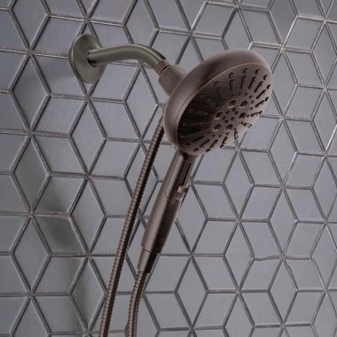 Click here to see Delta 54910-RB-PK Delta 7-Setting Hand Shower, SureDock, Touch-Clean, H2Okinetic PowerDrench Spray, 1.75 GPM, Venetian Bronze - 54910-RB-PK
